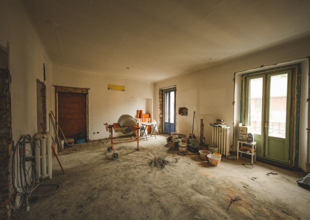 Room under renovation with construction materials