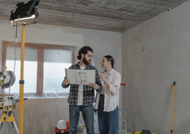 Reviewing renovation blueprint plans